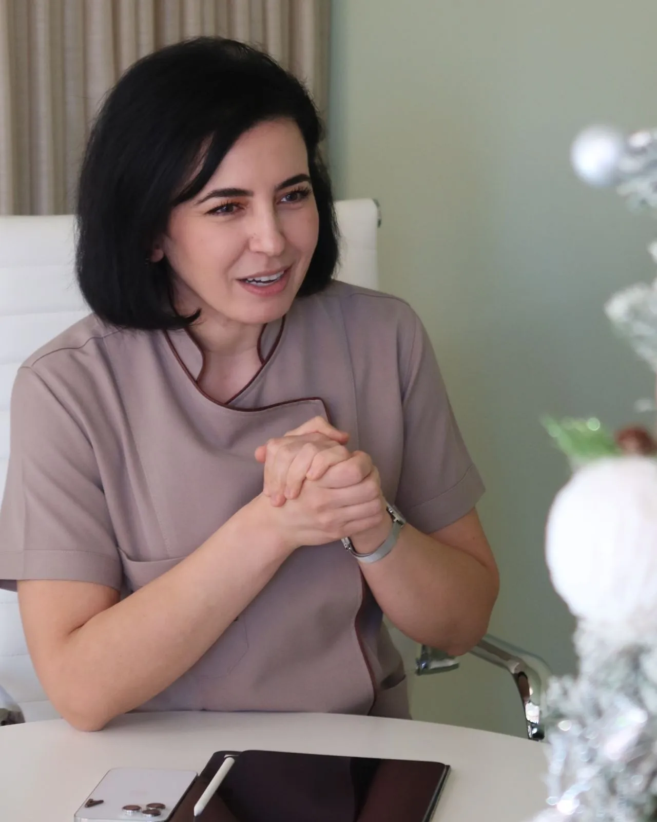 Smiling dental patient in a modern clinic in Tirana